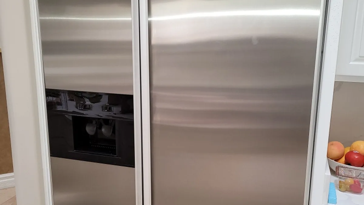 Factory-certified appliance repair technician servicing luxury refrigeration, laundry suites, and cooking ranges in Calumet City, IL